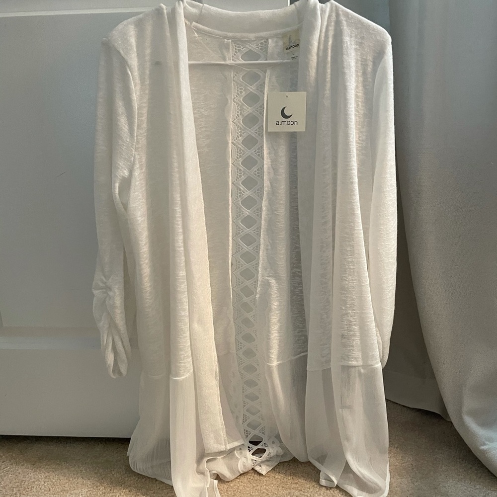 A.moon cardigan, flowy, with a detailed back